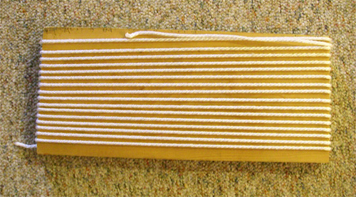 rope-kit-1 Step One: Wrap the rope around the board so that the turns do not overlap at one end.