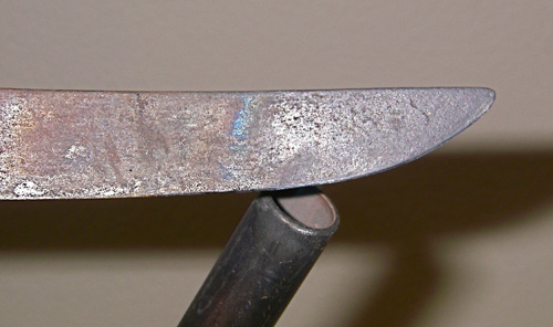 rope-kit-2 Step Two: Heat the tip of a sharp knife red hot.