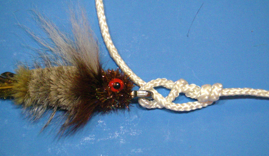 Clinch-WRONG The Clinch Knot as it appears when the short end is pulled during tightening.